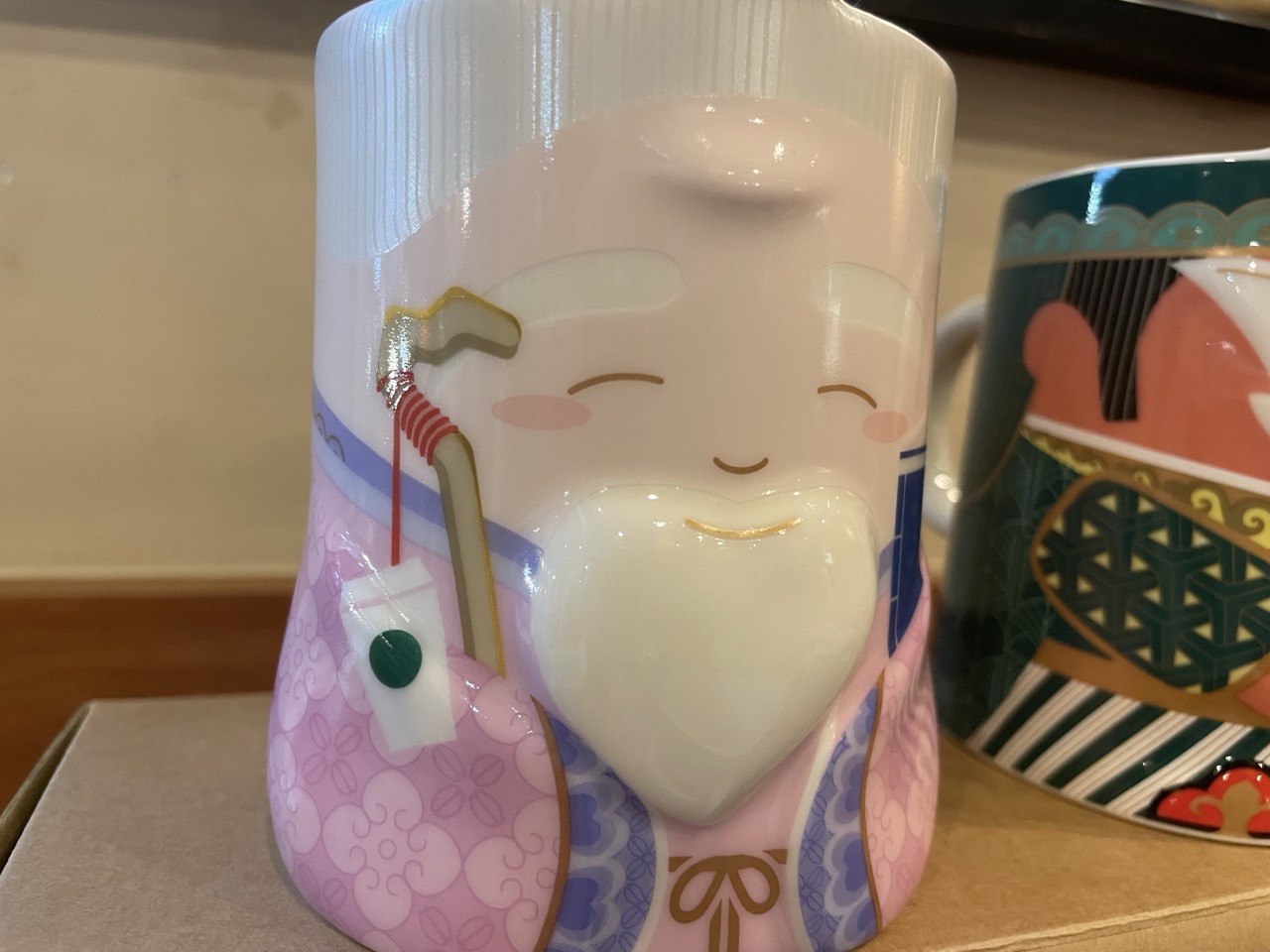 TAZA cara sonriente Tudi Gong